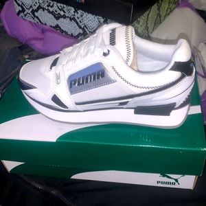 White and black puma shoe size 6